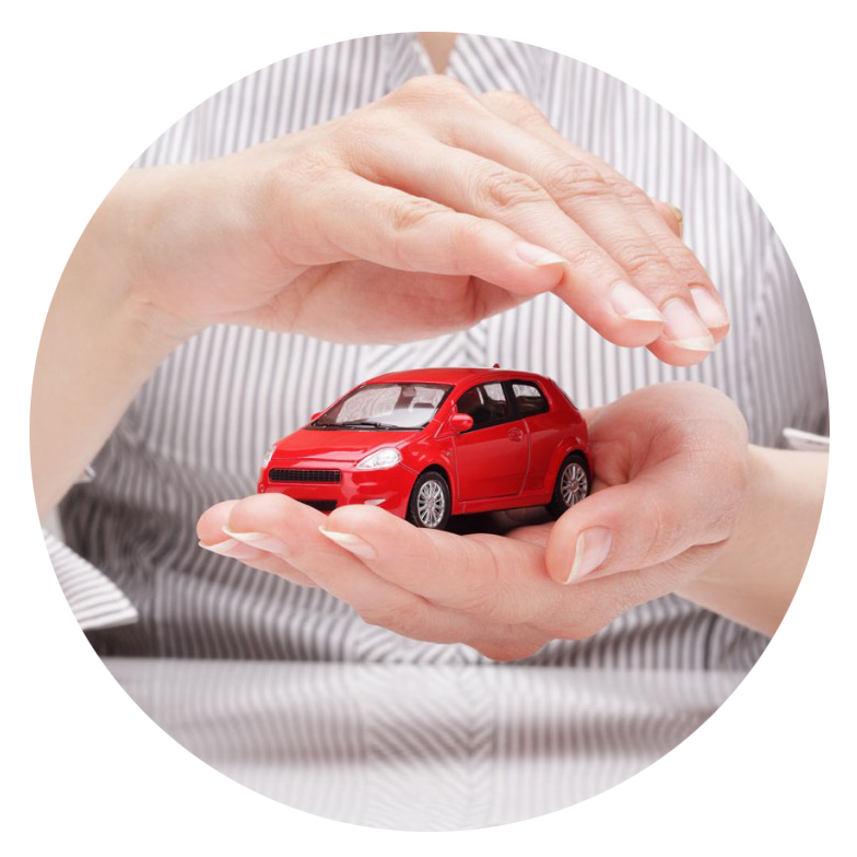 a person holding a red toy car